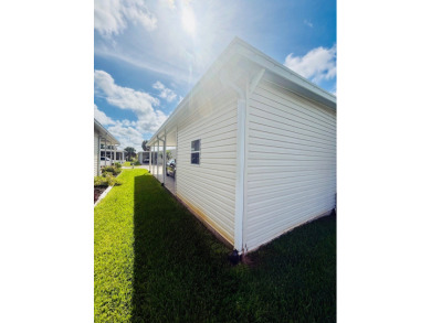 AMAZING CORNER LOT FEATURING A 3-BEDROOM, 2-BATHROOM HOME WITH on Cypress Greens in Florida - for sale on GolfHomes.com, golf home, golf lot