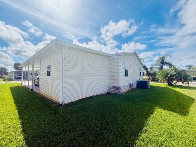 AMAZING CORNER LOT FEATURING A 3-BEDROOM, 2-BATHROOM HOME WITH on Cypress Greens in Florida - for sale on GolfHomes.com, golf home, golf lot