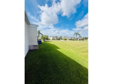 AMAZING CORNER LOT FEATURING A 3-BEDROOM, 2-BATHROOM HOME WITH on Cypress Greens in Florida - for sale on GolfHomes.com, golf home, golf lot