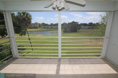 NESTLED IN ONE OF PALM AIRE COUNTRY CLUB'S MOST DESIRABLE on Palm-Aire Country Club and Resort - The Oaks in Florida - for sale on GolfHomes.com, golf home, golf lot