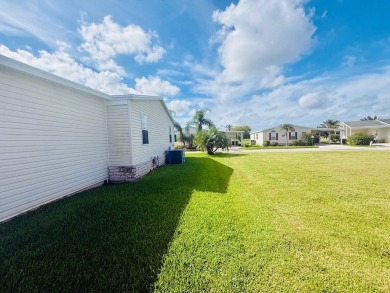 AMAZING CORNER LOT FEATURING A 3-BEDROOM, 2-BATHROOM HOME WITH on Cypress Greens in Florida - for sale on GolfHomes.com, golf home, golf lot