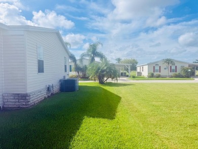 AMAZING CORNER LOT FEATURING A 3-BEDROOM, 2-BATHROOM HOME WITH on Cypress Greens in Florida - for sale on GolfHomes.com, golf home, golf lot