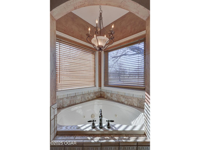 Luxury home located off the #3 tee box in Baxter Springs, KS on Baxter Country Club in Kansas - for sale on GolfHomes.com, golf home, golf lot