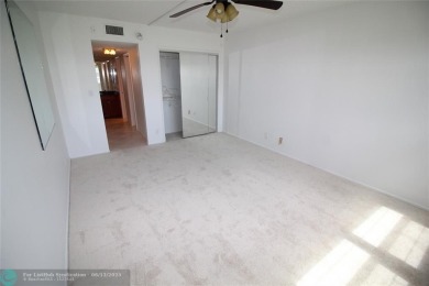NESTLED IN ONE OF PALM AIRE COUNTRY CLUB'S MOST DESIRABLE on Palm-Aire Country Club and Resort - The Oaks in Florida - for sale on GolfHomes.com, golf home, golf lot