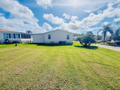AMAZING CORNER LOT FEATURING A 3-BEDROOM, 2-BATHROOM HOME WITH on Cypress Greens in Florida - for sale on GolfHomes.com, golf home, golf lot