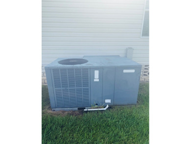 AMAZING CORNER LOT FEATURING A 3-BEDROOM, 2-BATHROOM HOME WITH on Cypress Greens in Florida - for sale on GolfHomes.com, golf home, golf lot