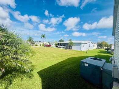 AMAZING CORNER LOT FEATURING A 3-BEDROOM, 2-BATHROOM HOME WITH on Cypress Greens in Florida - for sale on GolfHomes.com, golf home, golf lot