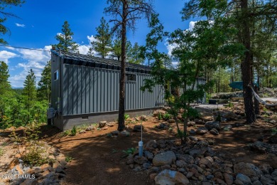 Perched on a serene hillside in Munds Park and bordered by on Pinewood Country Club in Arizona - for sale on GolfHomes.com, golf home, golf lot