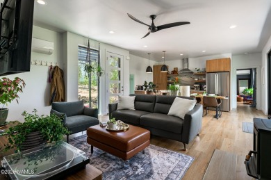 Perched on a serene hillside in Munds Park and bordered by on Pinewood Country Club in Arizona - for sale on GolfHomes.com, golf home, golf lot