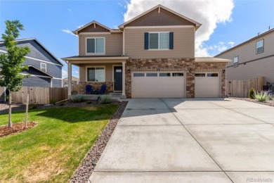 This stunning, like-new home is in pristine condition, with a on Riverdale Golf Club in Colorado - for sale on GolfHomes.com, golf home, golf lot