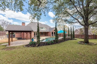 Set high on almost .4-acre corner lot in Lakeside Crossing, this on Stonebridge Ranch Country Club in Texas - for sale on GolfHomes.com, golf home, golf lot