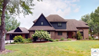 This expansive two-story residence, located in the desirable on Sedalia Country Club in Missouri - for sale on GolfHomes.com, golf home, golf lot