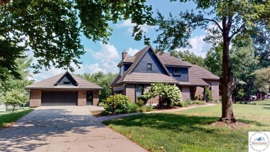 This expansive two-story residence, located in the desirable on Sedalia Country Club in Missouri - for sale on GolfHomes.com, golf home, golf lot