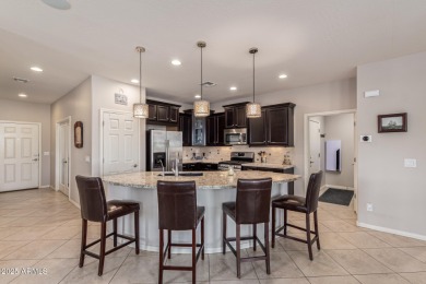 This stunning Serenade floor plan offers the perfect blend of on Estrella Mountain Ranch Golf Course in Arizona - for sale on GolfHomes.com, golf home, golf lot