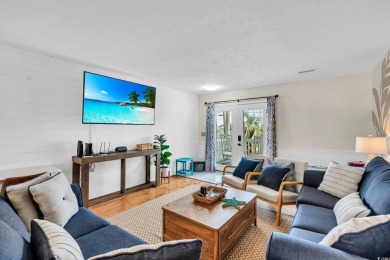 GREAT RENTAL INCOME!!  This Cherry Grove channel home is a on Beachwood Golf Club in South Carolina - for sale on GolfHomes.com, golf home, golf lot