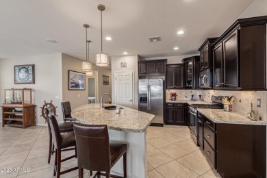 This stunning Serenade floor plan offers the perfect blend of on Estrella Mountain Ranch Golf Course in Arizona - for sale on GolfHomes.com, golf home, golf lot