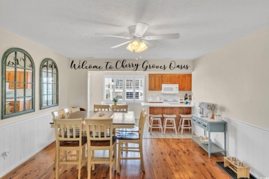 GREAT RENTAL INCOME!!  This Cherry Grove channel home is a on Beachwood Golf Club in South Carolina - for sale on GolfHomes.com, golf home, golf lot