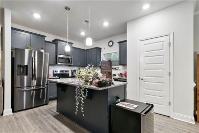 Set in a desirable golf course neighborhood, this stylish on St. Andrews Golf and Country Club in Georgia - for sale on GolfHomes.com, golf home, golf lot