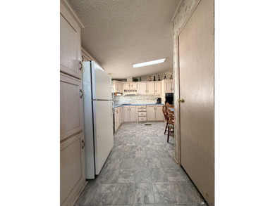 Spectacular deal for a two-bedroom home in town!! Needs a *tad* on Desert Hills Golf Course in Arizona - for sale on GolfHomes.com, golf home, golf lot