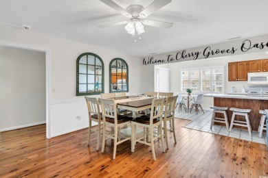 GREAT RENTAL INCOME!!  This Cherry Grove channel home is a on Beachwood Golf Club in South Carolina - for sale on GolfHomes.com, golf home, golf lot