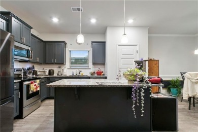Set in a desirable golf course neighborhood, this stylish on St. Andrews Golf and Country Club in Georgia - for sale on GolfHomes.com, golf home, golf lot