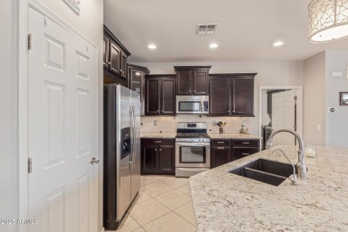 This stunning Serenade floor plan offers the perfect blend of on Estrella Mountain Ranch Golf Course in Arizona - for sale on GolfHomes.com, golf home, golf lot