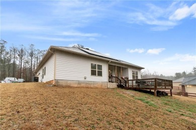 Set in a desirable golf course neighborhood, this stylish on St. Andrews Golf and Country Club in Georgia - for sale on GolfHomes.com, golf home, golf lot