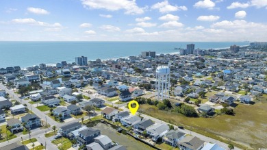 GREAT RENTAL INCOME!!  This Cherry Grove channel home is a on Beachwood Golf Club in South Carolina - for sale on GolfHomes.com, golf home, golf lot