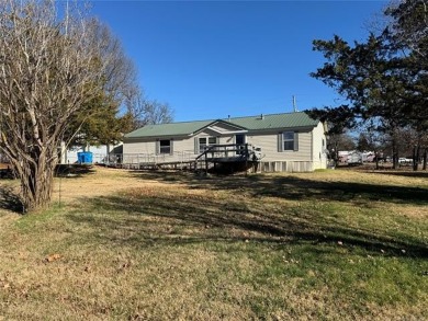 Welcome to 34 Bokchito in Canadian! This 4-bedroom, 2 bath home on Arrowhead State Park Golf Course in Oklahoma - for sale on GolfHomes.com, golf home, golf lot