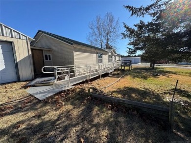 Welcome to 34 Bokchito in Canadian! This 4-bedroom, 2 bath home on Arrowhead State Park Golf Course in Oklahoma - for sale on GolfHomes.com, golf home, golf lot