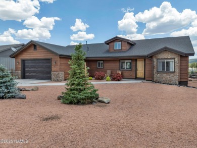 Discover this beautiful single-level home in historic Williams on Elephant Rocks at Williams in Arizona - for sale on GolfHomes.com, golf home, golf lot