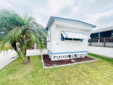 This home is located in a 55+ community in the back of the park on Lone Palm Golf Club in Florida - for sale on GolfHomes.com, golf home, golf lot