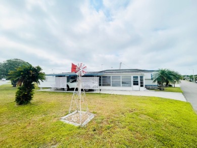 This home is located in a 55+ community in the back of the park on Lone Palm Golf Club in Florida - for sale on GolfHomes.com, golf home, golf lot