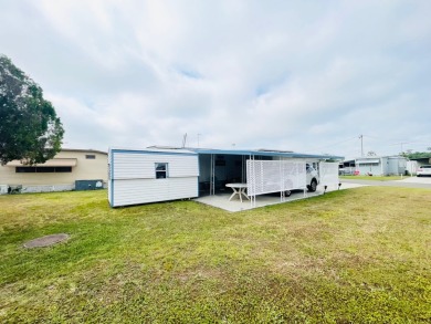This home is located in a 55+ community in the back of the park on Lone Palm Golf Club in Florida - for sale on GolfHomes.com, golf home, golf lot