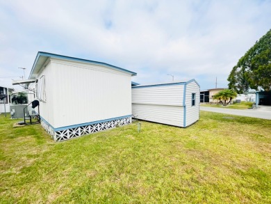 This home is located in a 55+ community in the back of the park on Lone Palm Golf Club in Florida - for sale on GolfHomes.com, golf home, golf lot