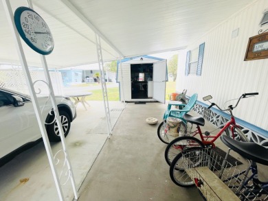 This home is located in a 55+ community in the back of the park on Lone Palm Golf Club in Florida - for sale on GolfHomes.com, golf home, golf lot