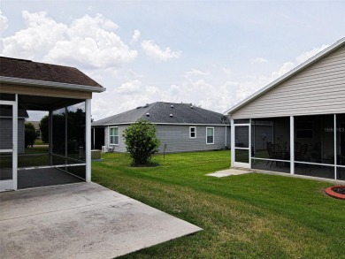 Looking for The Villages lifestyle in a 2-bedroom 2 bath plus on The Links of Spruce Creek in Florida - for sale on GolfHomes.com, golf home, golf lot