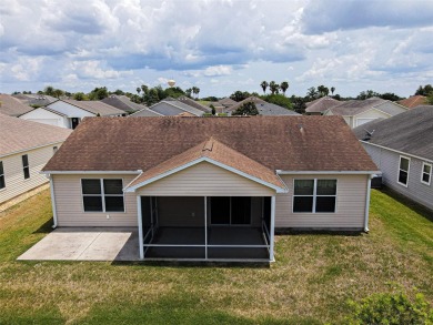 Looking for The Villages lifestyle in a 2-bedroom 2 bath plus on The Links of Spruce Creek in Florida - for sale on GolfHomes.com, golf home, golf lot