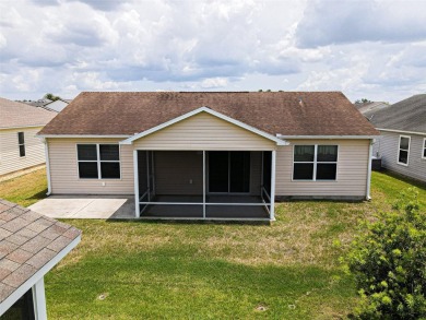 Looking for The Villages lifestyle in a 2-bedroom 2 bath plus on The Links of Spruce Creek in Florida - for sale on GolfHomes.com, golf home, golf lot