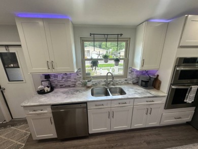 Lot Rent $1342.00 monthly  This beautifully updated 2-bedrooms on Del Tura Golf and Country Club in Florida - for sale on GolfHomes.com, golf home, golf lot