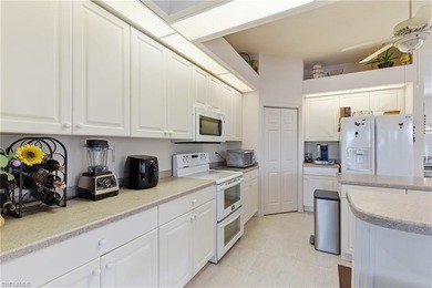 Enjoy beautiful sunsets by the pool in one of the cleanest and on Spanish Wells Golf and Country Club in Florida - for sale on GolfHomes.com, golf home, golf lot