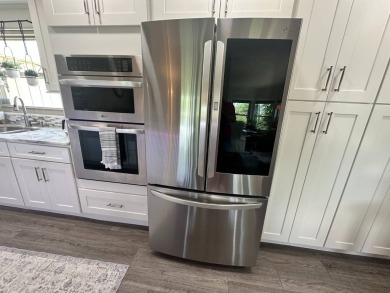 Lot Rent $1342.00 monthly  This beautifully updated 2-bedrooms on Del Tura Golf and Country Club in Florida - for sale on GolfHomes.com, golf home, golf lot
