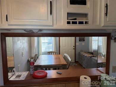 Cute, spacious 2 bedroom, 1 bath unit with lots of sleeping on The Tillery Tradition Country Club in North Carolina - for sale on GolfHomes.com, golf home, golf lot