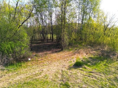 Discover the perfect blend of seclusion and convenience with on Sandstone Area Country Club in Minnesota - for sale on GolfHomes.com, golf home, golf lot