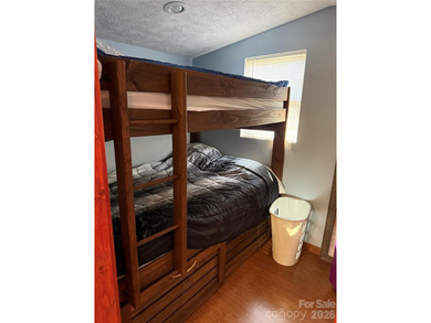 Cute, spacious 2 bedroom, 1 bath unit with lots of sleeping on The Tillery Tradition Country Club in North Carolina - for sale on GolfHomes.com, golf home, golf lot