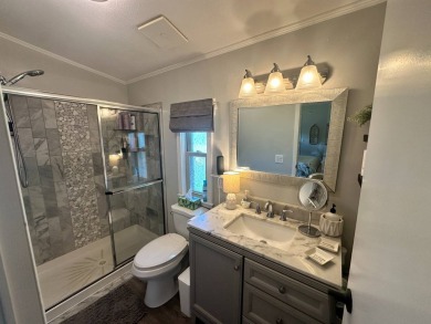 Lot Rent $1342.00 monthly  This beautifully updated 2-bedrooms on Del Tura Golf and Country Club in Florida - for sale on GolfHomes.com, golf home, golf lot