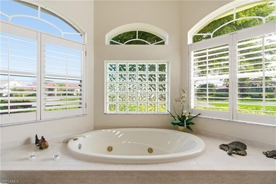 Enjoy beautiful sunsets by the pool in one of the cleanest and on Spanish Wells Golf and Country Club in Florida - for sale on GolfHomes.com, golf home, golf lot