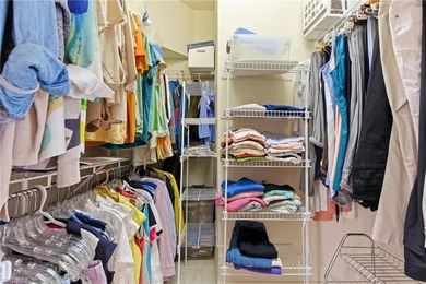 Enjoy beautiful sunsets by the pool in one of the cleanest and on Spanish Wells Golf and Country Club in Florida - for sale on GolfHomes.com, golf home, golf lot