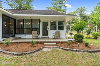 This delightful residence seamlessly blends style and comfort on Carolina Shores Golf Course in North Carolina - for sale on GolfHomes.com, golf home, golf lot