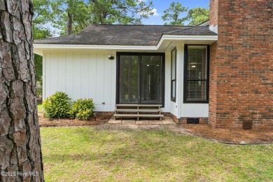 This delightful residence seamlessly blends style and comfort on Carolina Shores Golf Course in North Carolina - for sale on GolfHomes.com, golf home, golf lot
